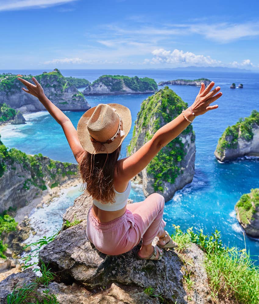 Vibrant person sits on cliff showing clear perspective as habit