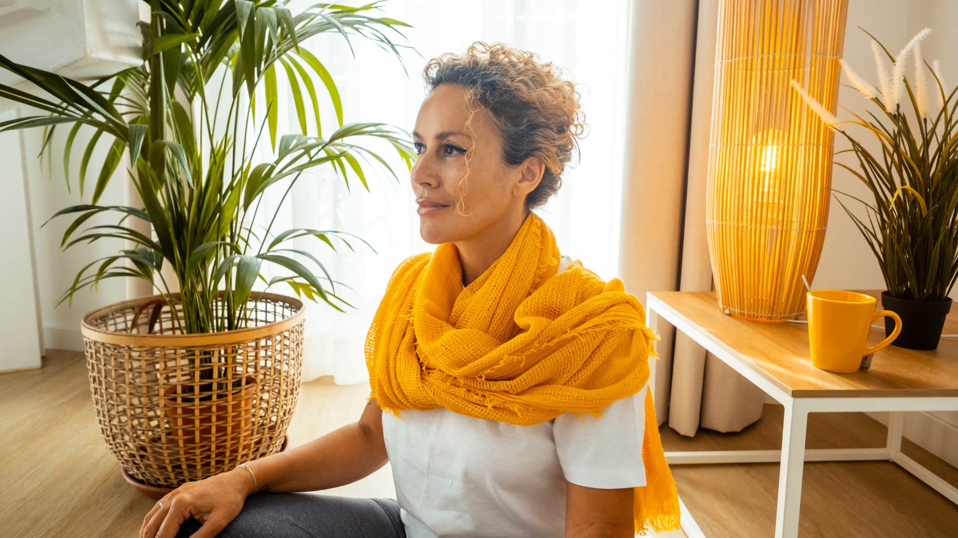 Calm person sits in though showing acceptance o tough year