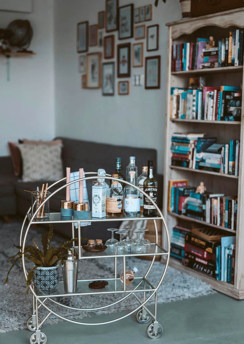bar cart near bookshelf