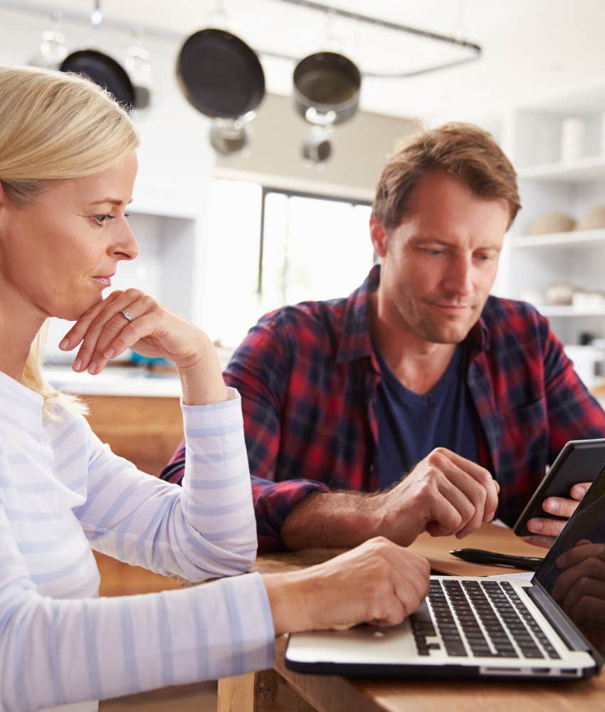 Focused couple use technology to innovate showing millennial skill