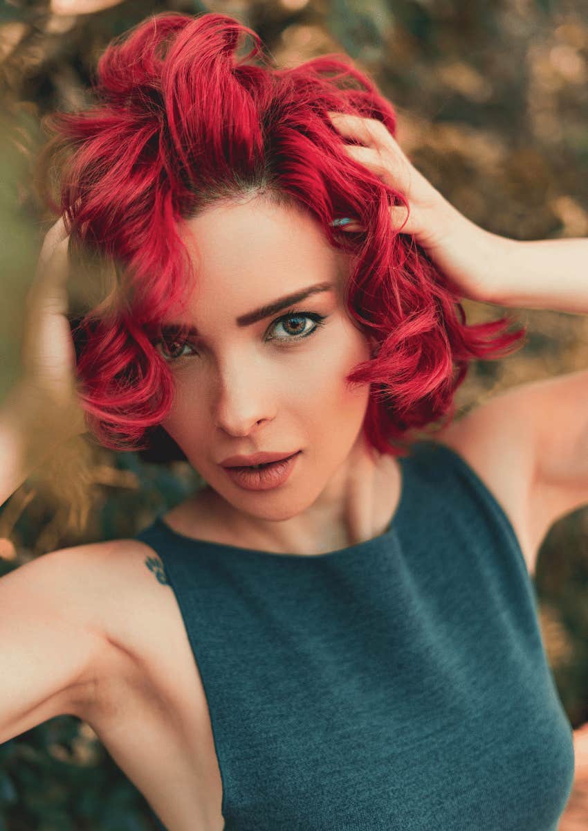 beautiful young woman with red dyed hair