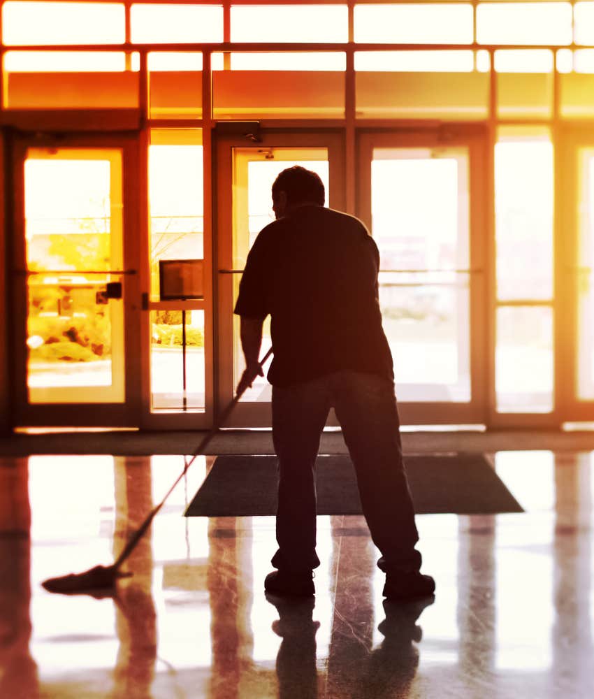 Janitor cleaning after boss scatters pennies floor
