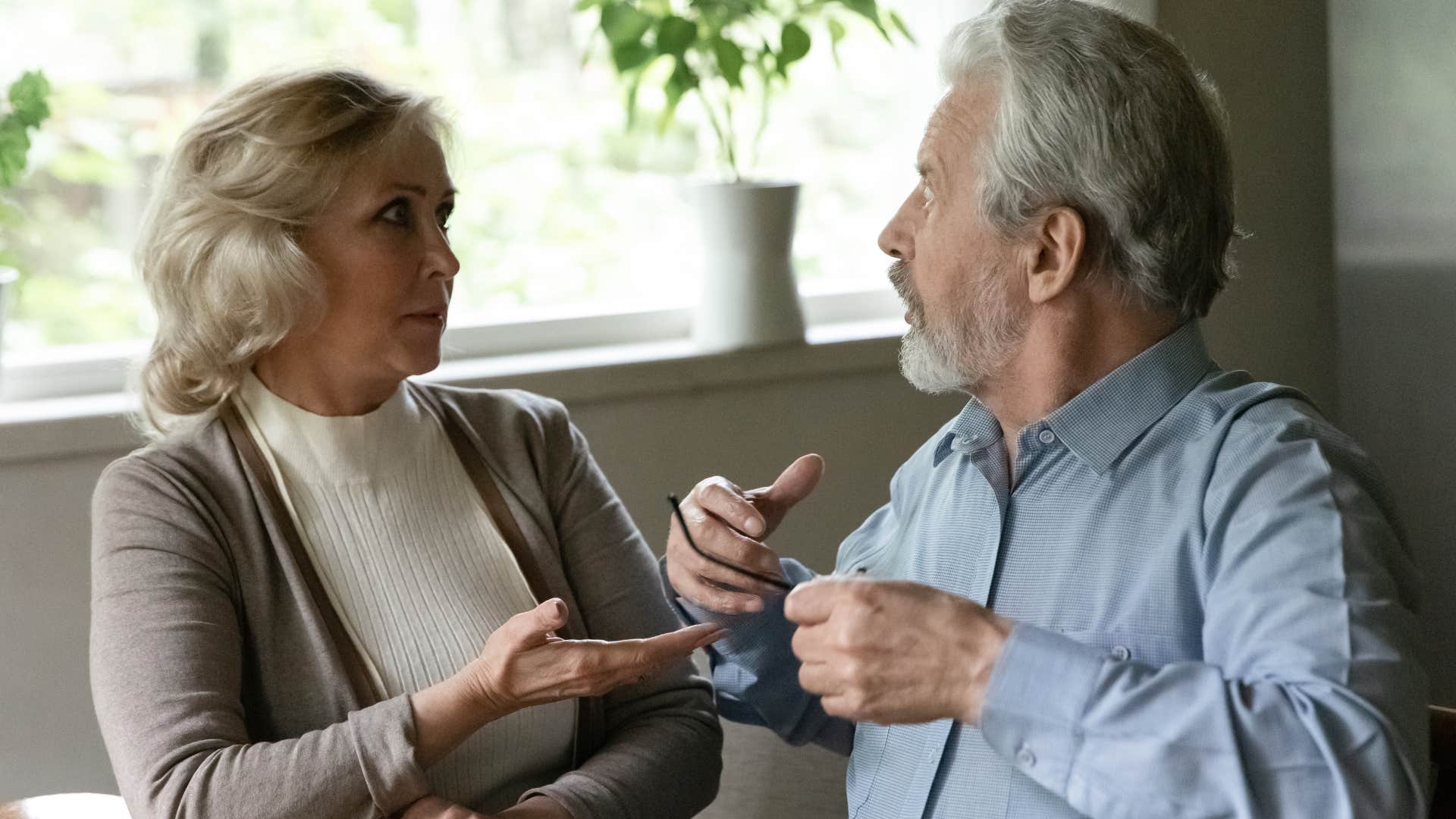 older man telling wife to just trust me on this