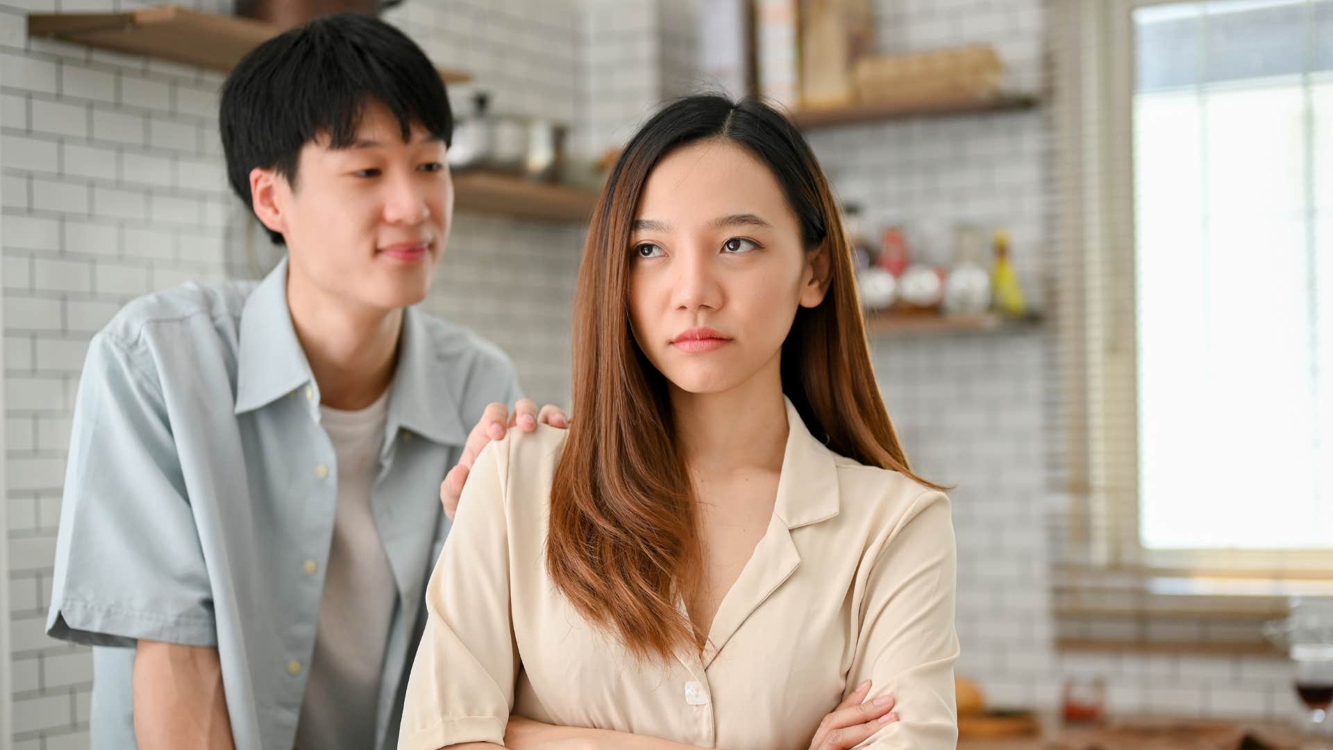 condescending man smirking telling wife well actually