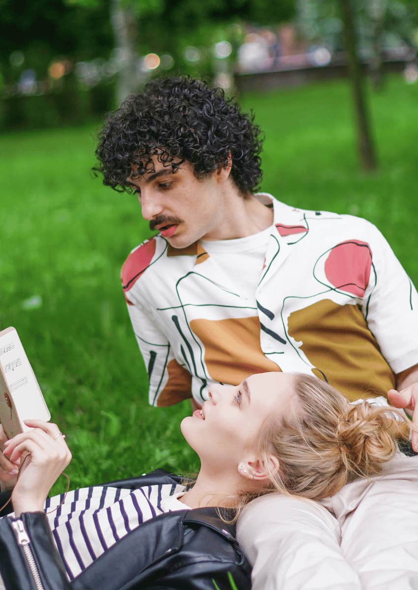 couple in park talking about books