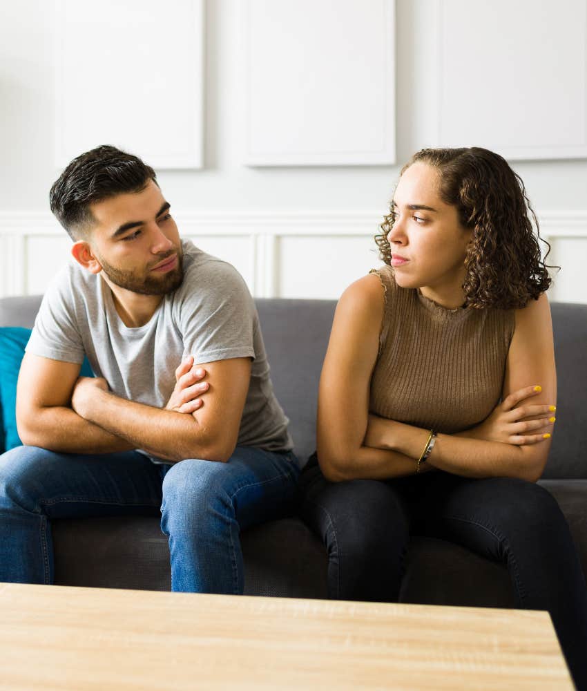 Angry couple stare in silence showing blame is disastrous behavior