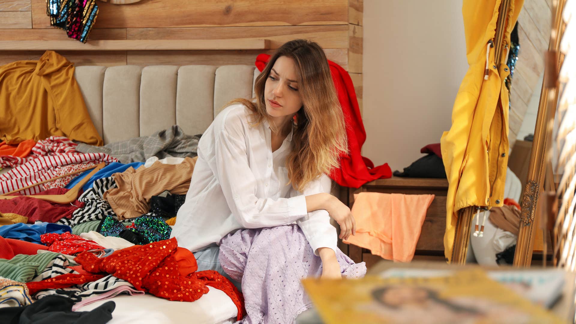 Mindful person decides which clothes to repurpose