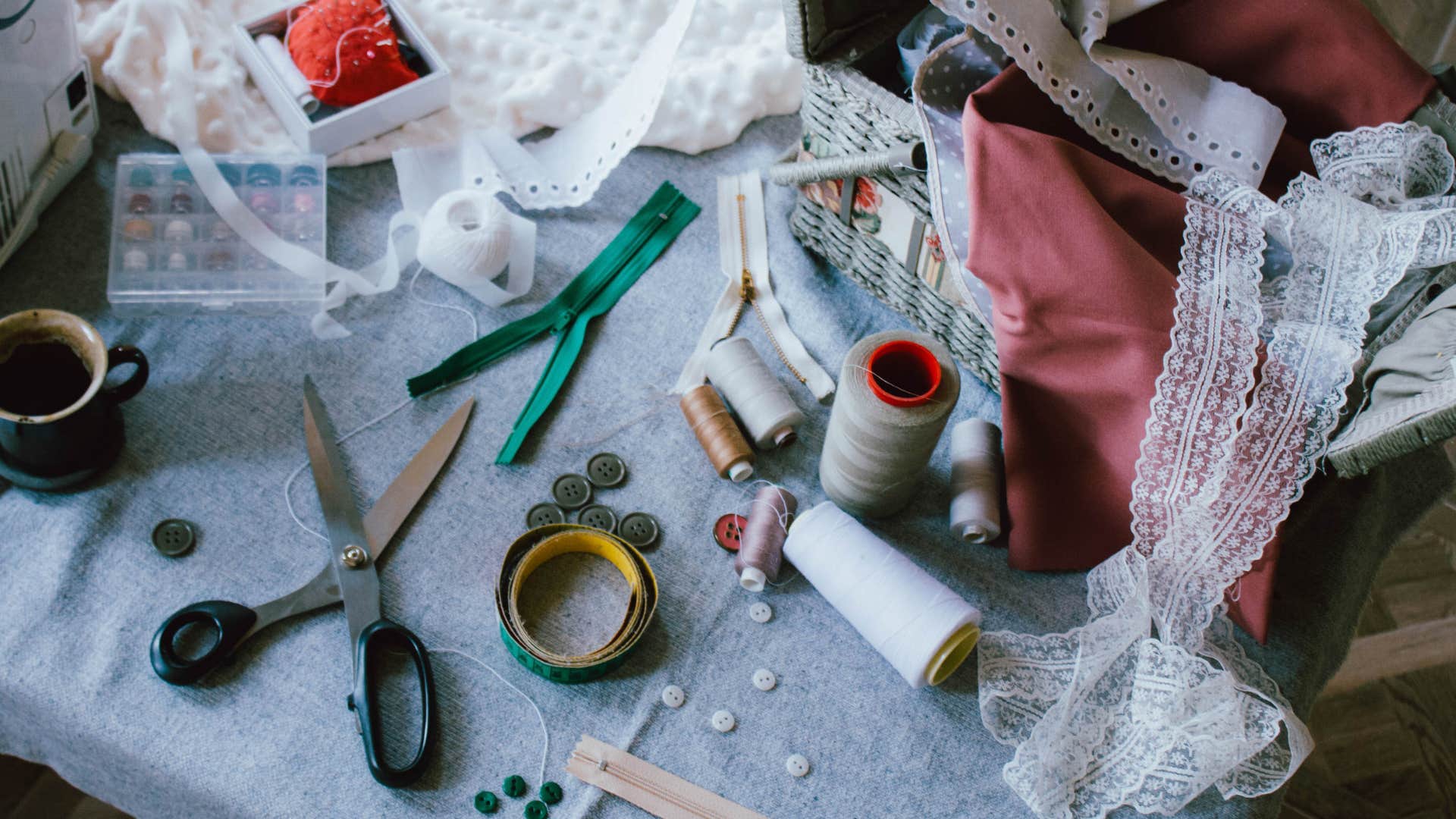 Scissors and other sewing notions showing ways to repurpose clothes