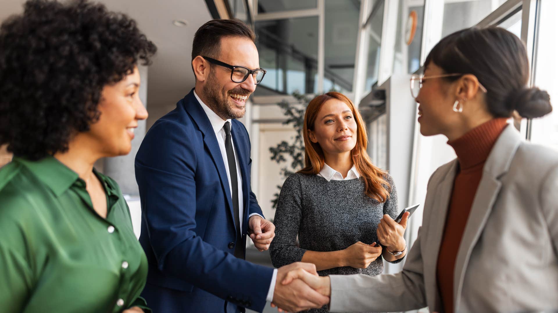 man shaking hands after being put on the spot