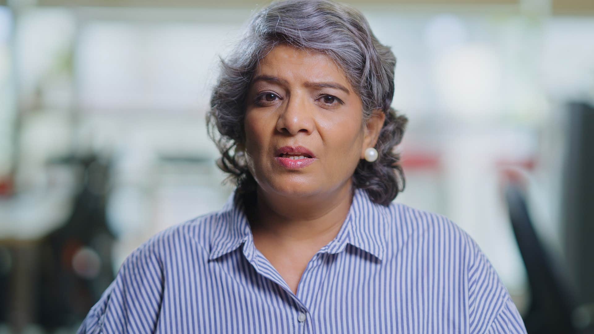 annoyed woman saying that's certainly interesting at work