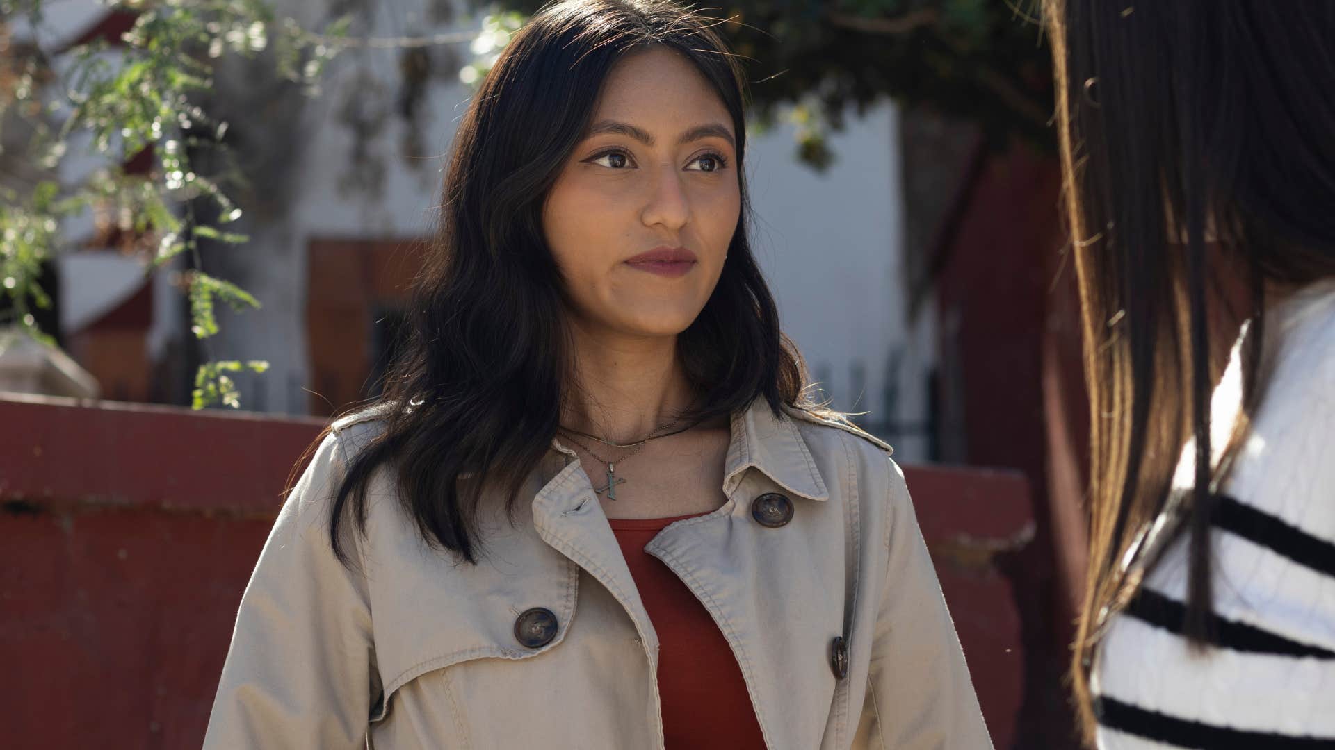 woman in face to face conversation telling person we're clearly not on the same level of intelligence