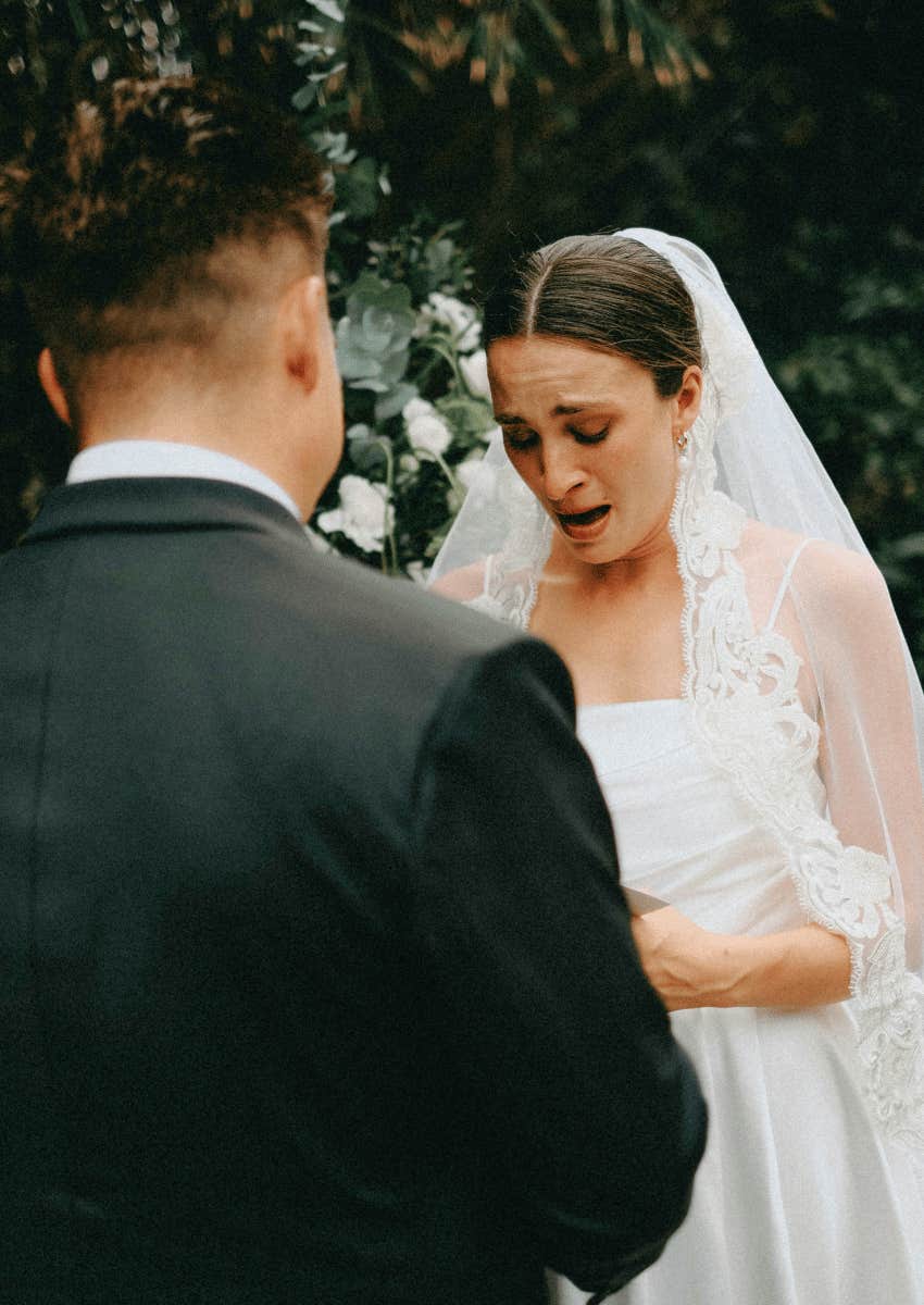 emotional bride talking to groom