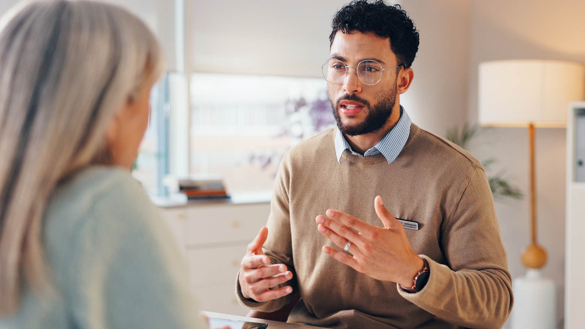 man asking colleague how would you prefer we approach this