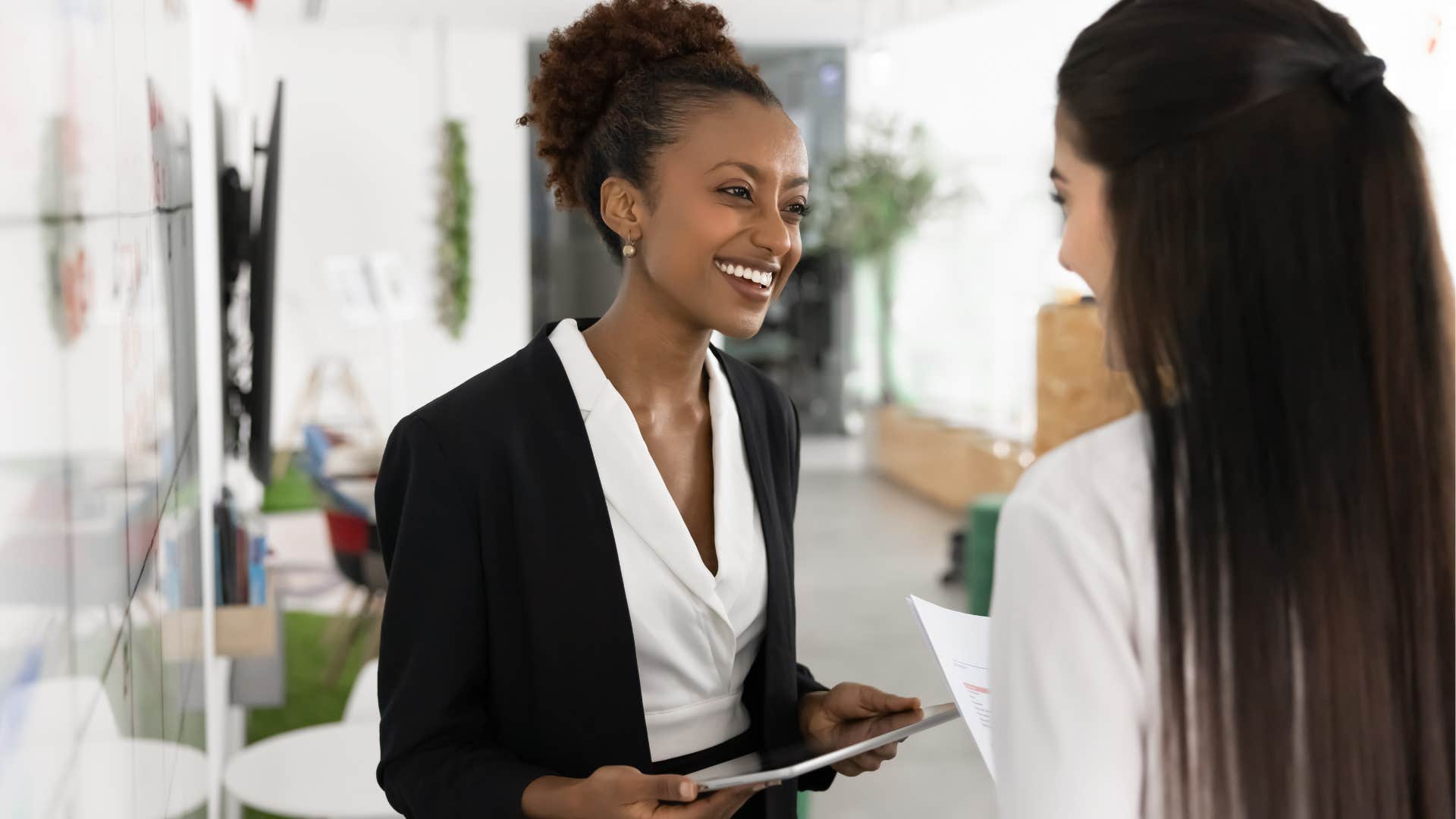 woman telling colleague I respect whatever you decide