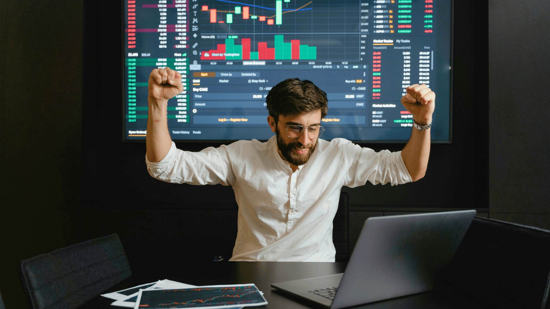 excited man reaching his goals