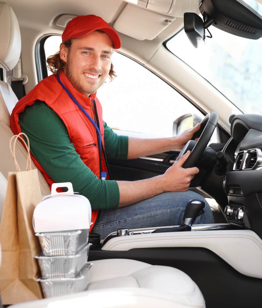 driver delivering food in car