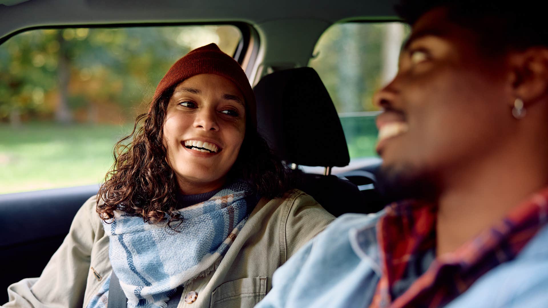 Loving couple on road trip vacation recall what's important