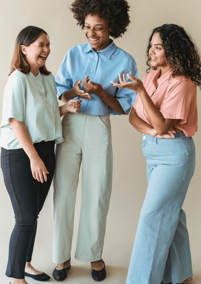 group of happy women talking with each other