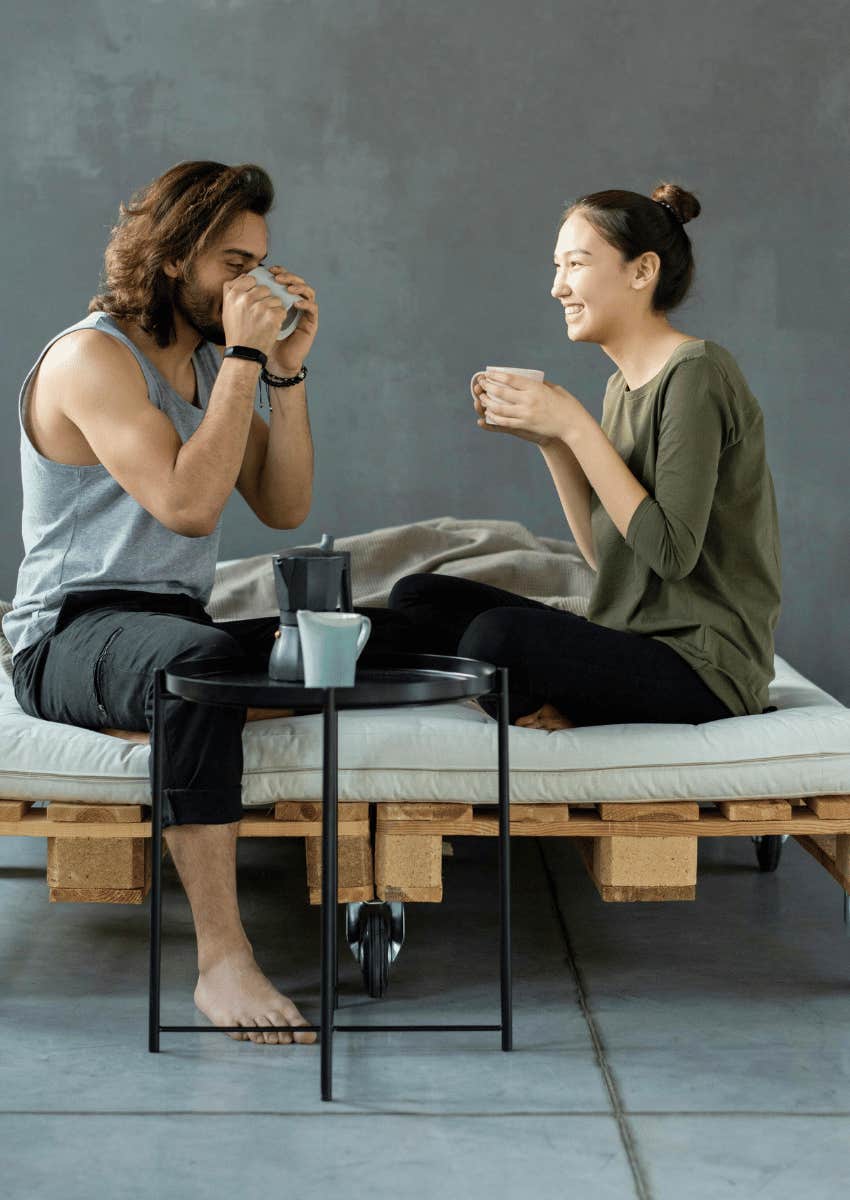 happy couple sharing drinks together