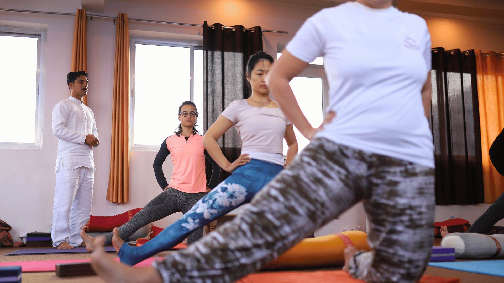 happy parent attending yoga session
