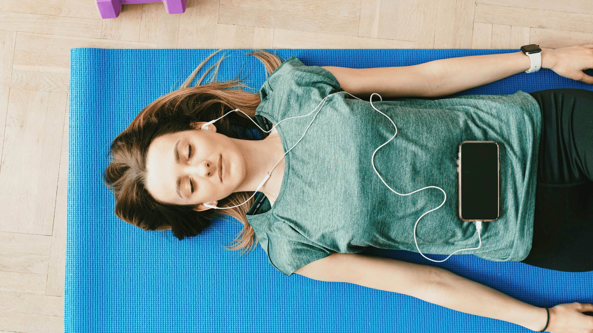 happy parent using mindfulness app