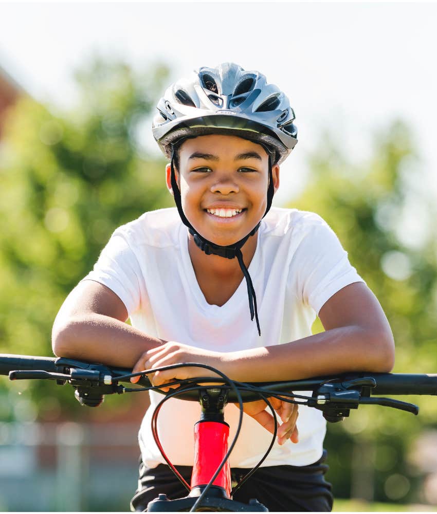 Only child on bicycle is not spoiled showing honest thing for parents