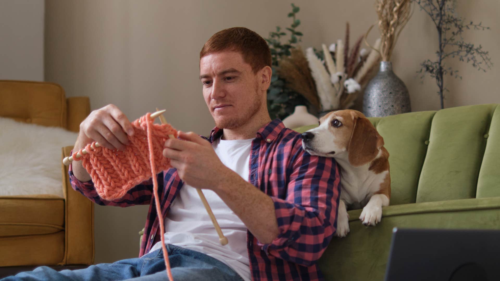 man knitting making a gift