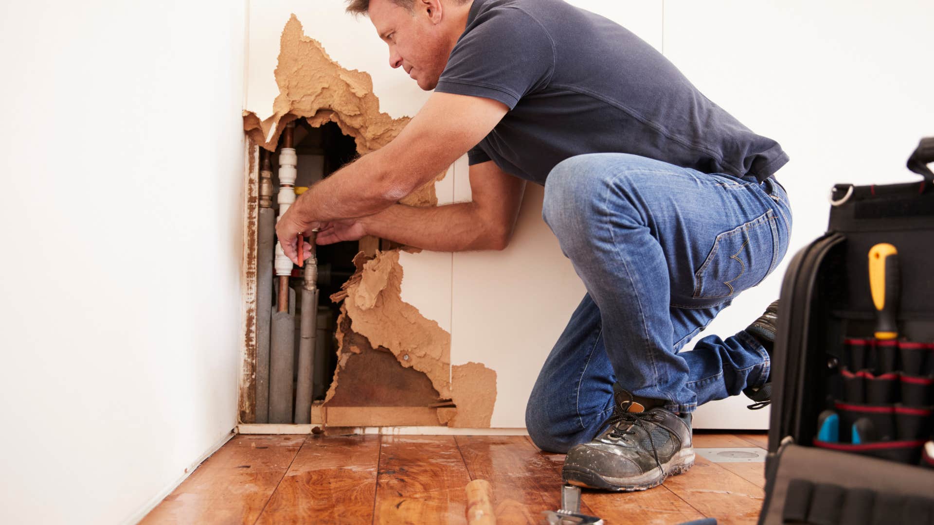 man who is a great catch doing home projects 