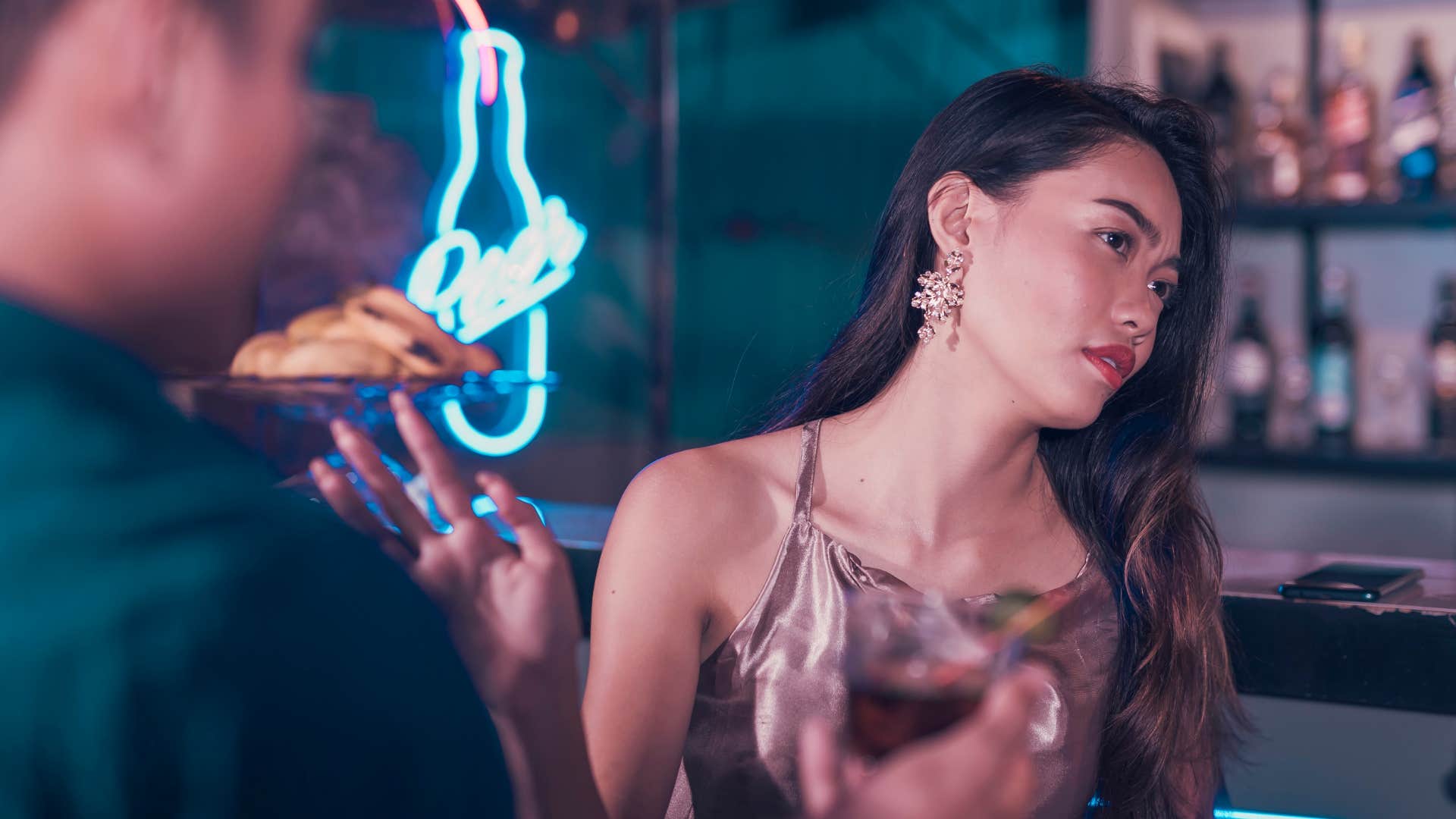 Disinterested person raises hand and turns away showing high-quality people say no