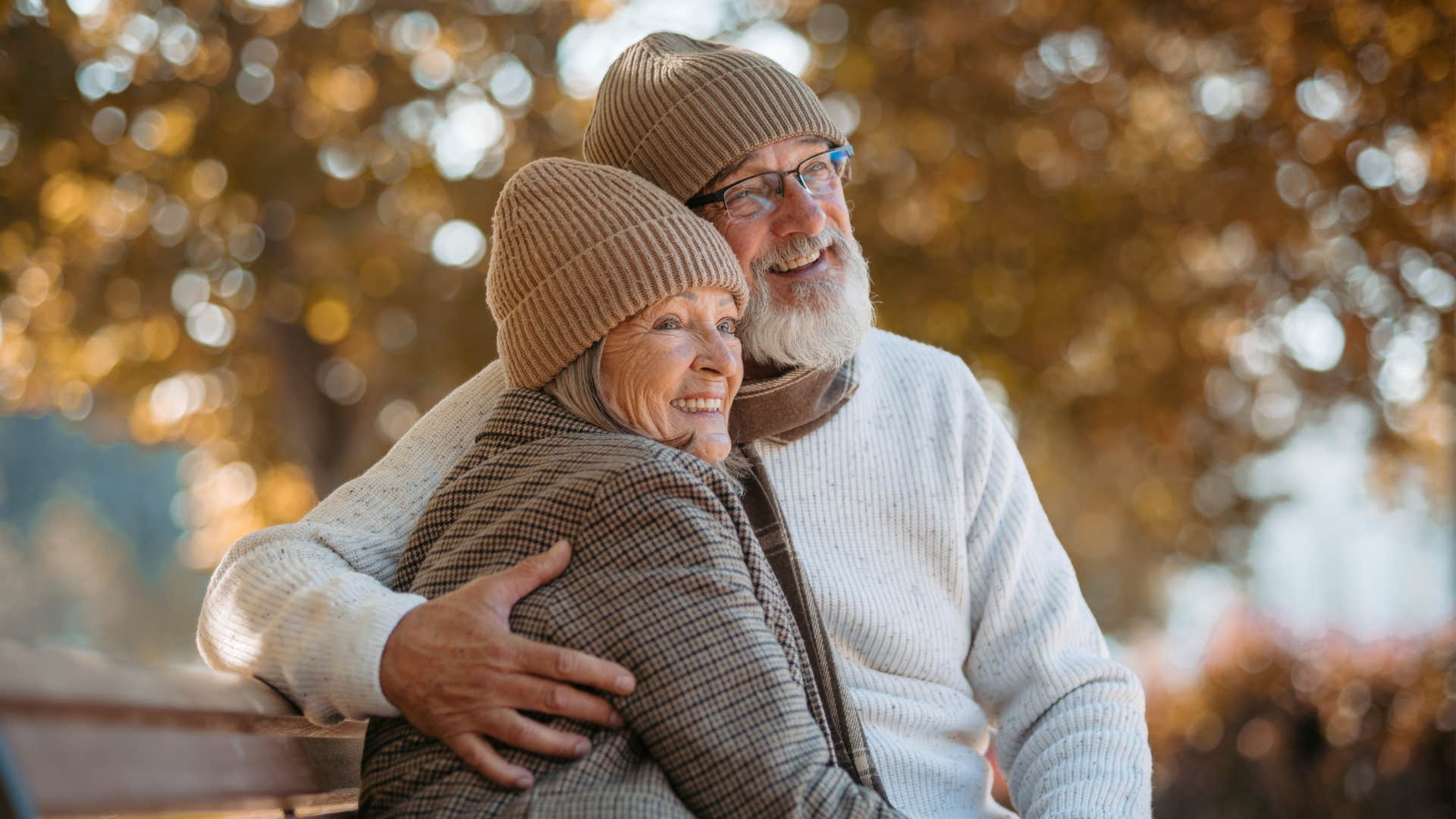 Elder couple side hug showing high-quality people learn from the past