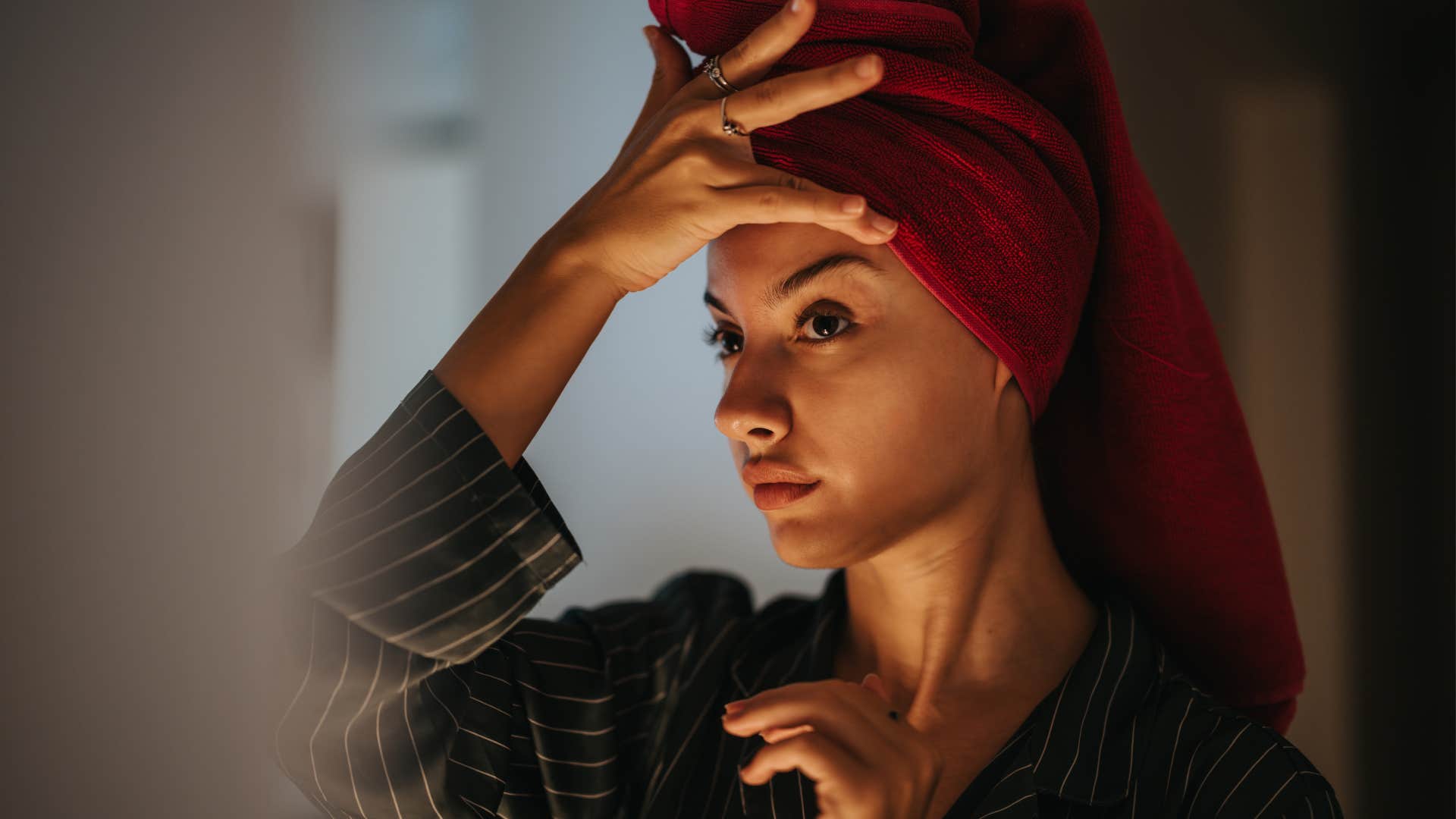 Relaxed person practices skin care showing high-quality people take time for themselves