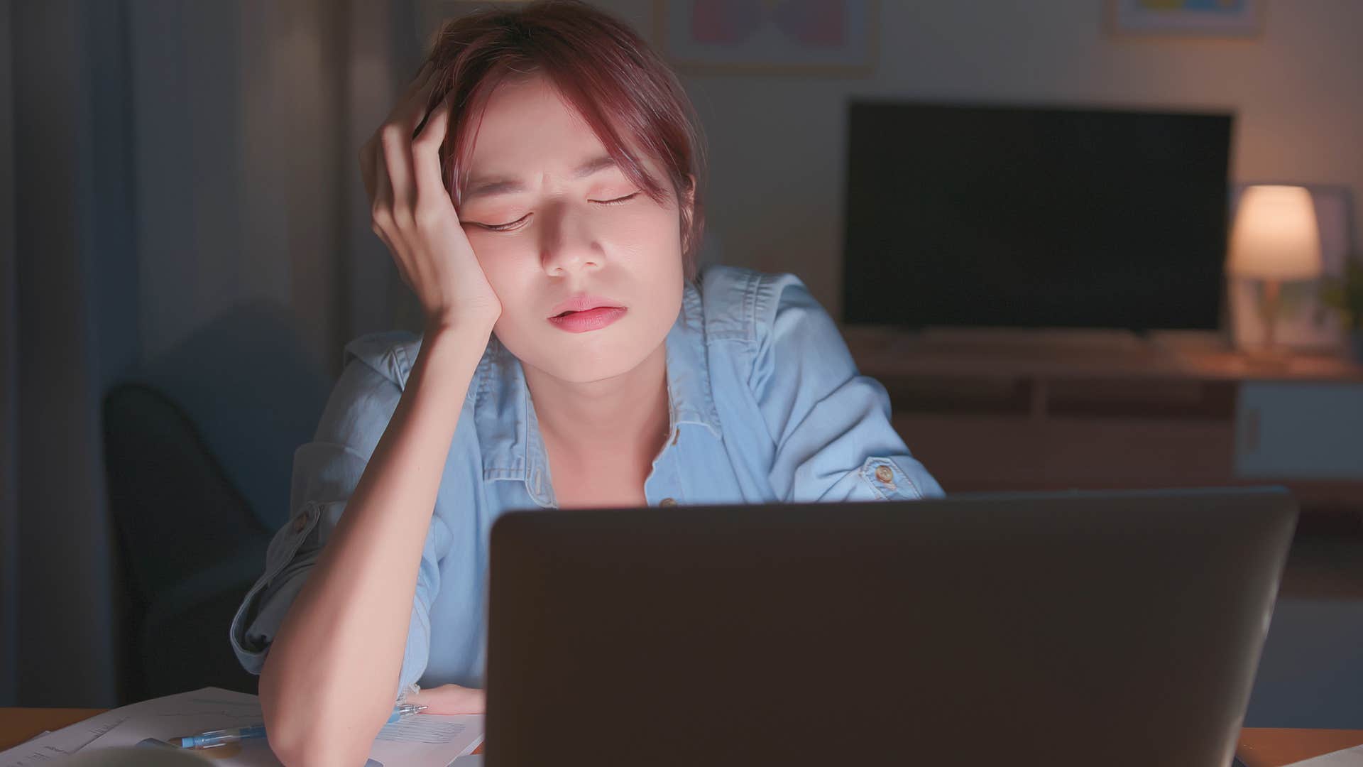 woman without a shared bedtime staying up late working