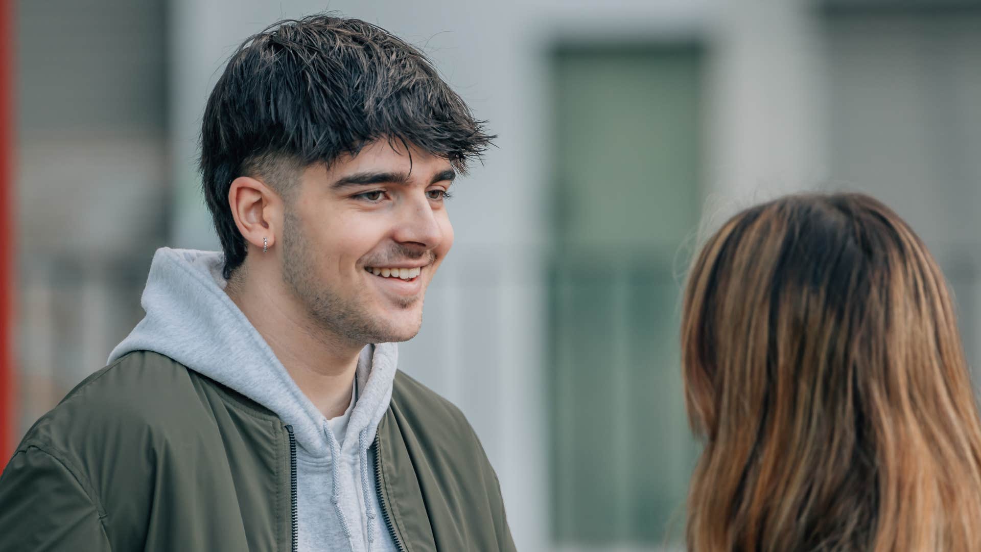 man saying he's a nice guy to woman