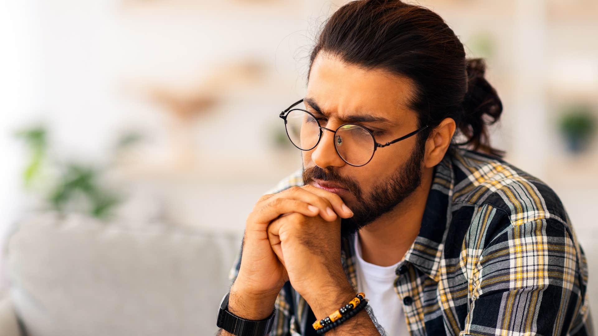 man sitting in silence comfortably