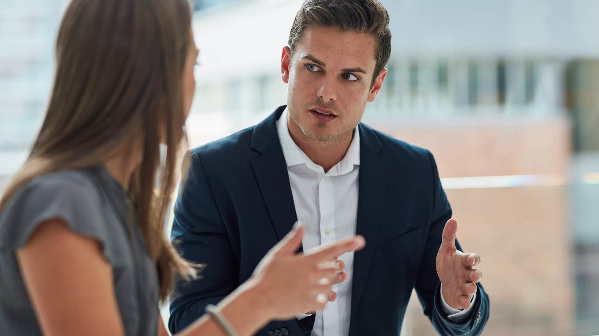 insecure man telling colleague i don't care
