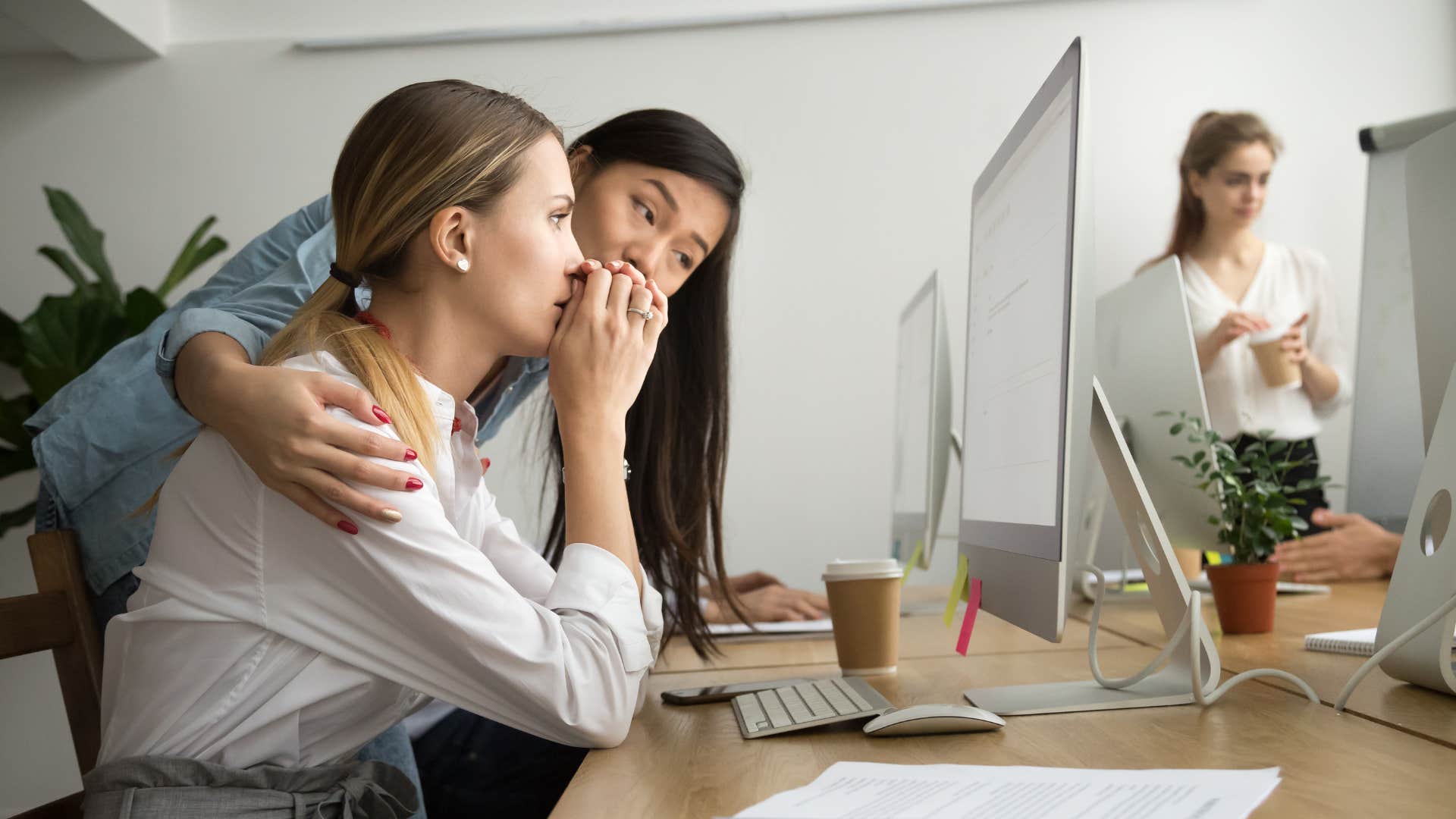 woman offering meaningless sympathy to a colleague