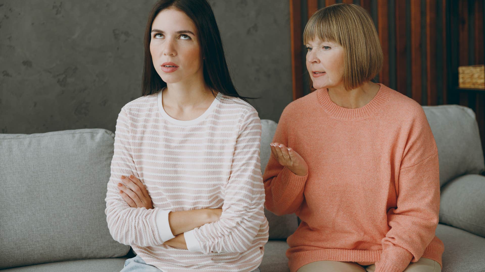 woman annoyed with mom bragging about pointless things