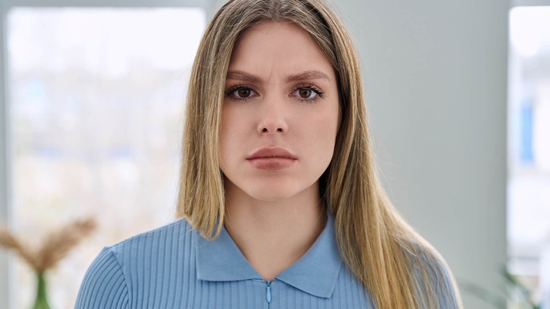 intelligent woman annoyed by people who don't keep promises