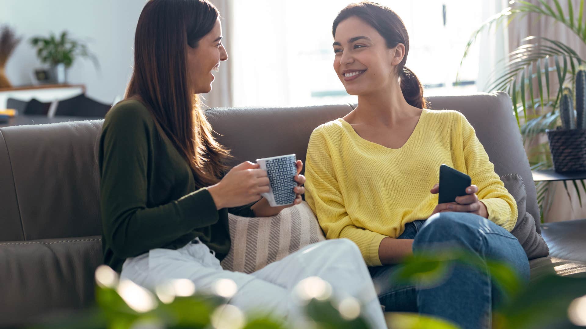 two women spreading gossip