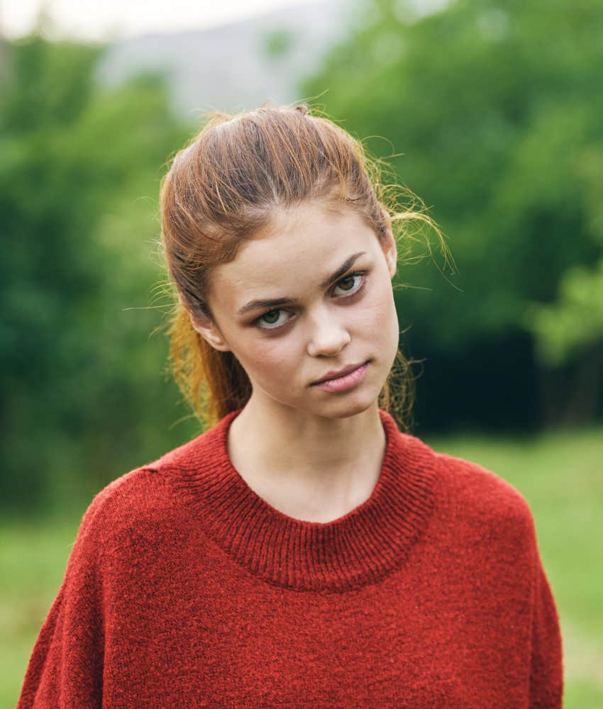 Uncertain person tilts head in doubt showing mindset reason you feel down