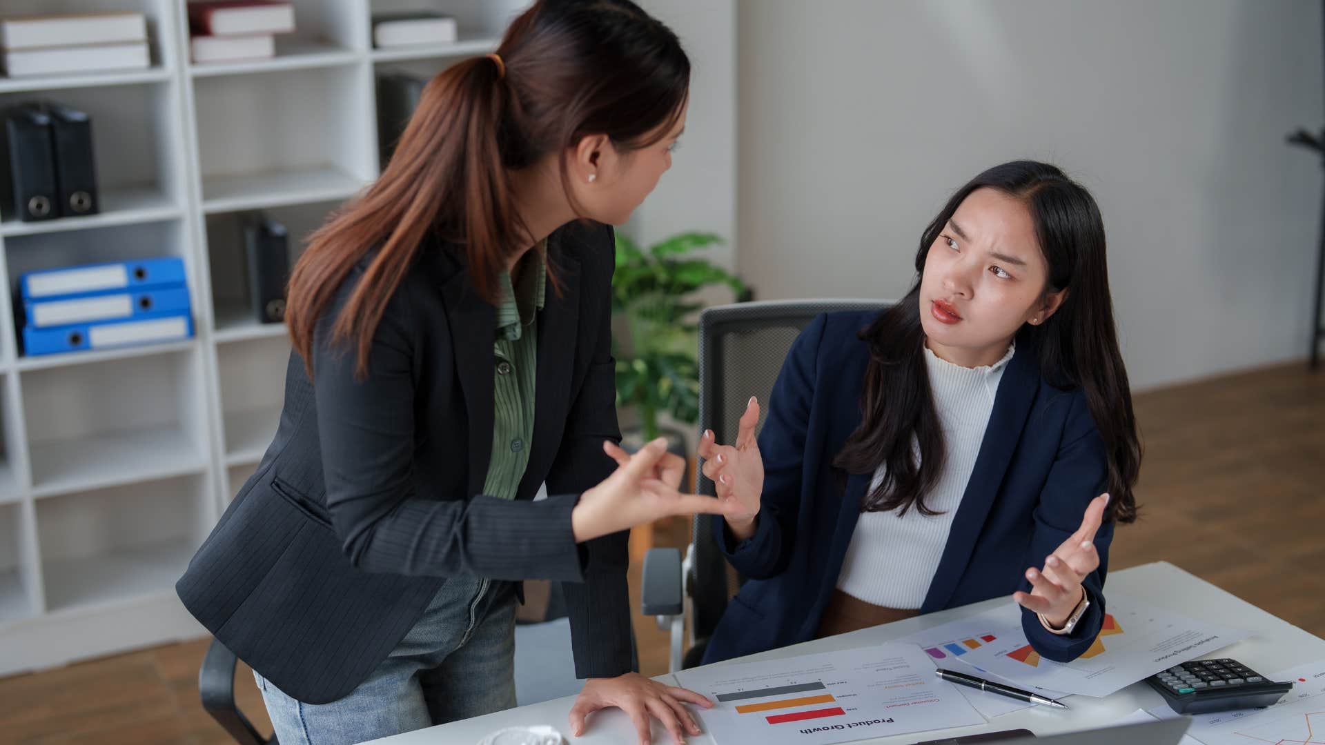 woman talking to colleague saying i need this asap