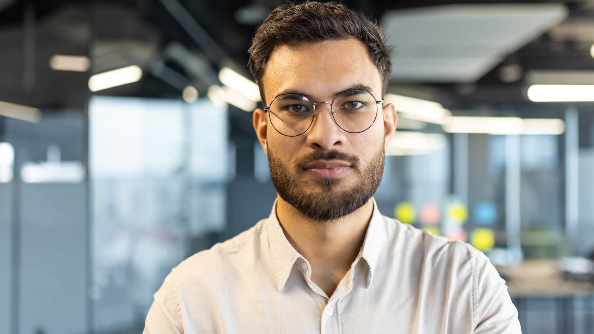 serious employee at work after being told the company is counting on him