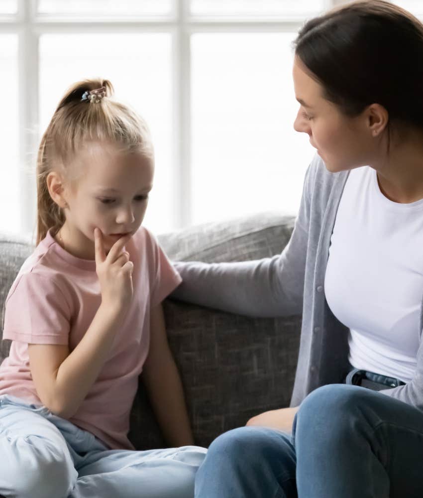 Concerned parent shows empathy for child showing good at unerstanding
