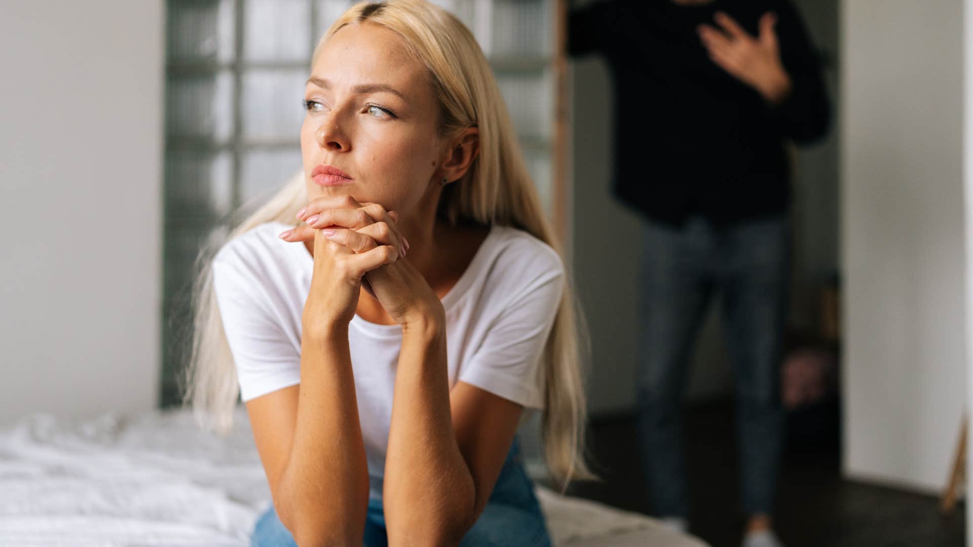 Woman avoiding conflict and hard conversations at home.