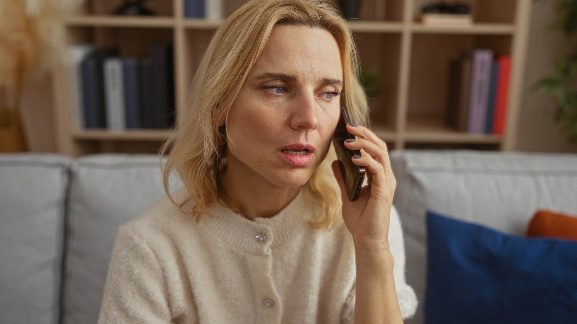 Woman worried about slowing down talking on the phone.