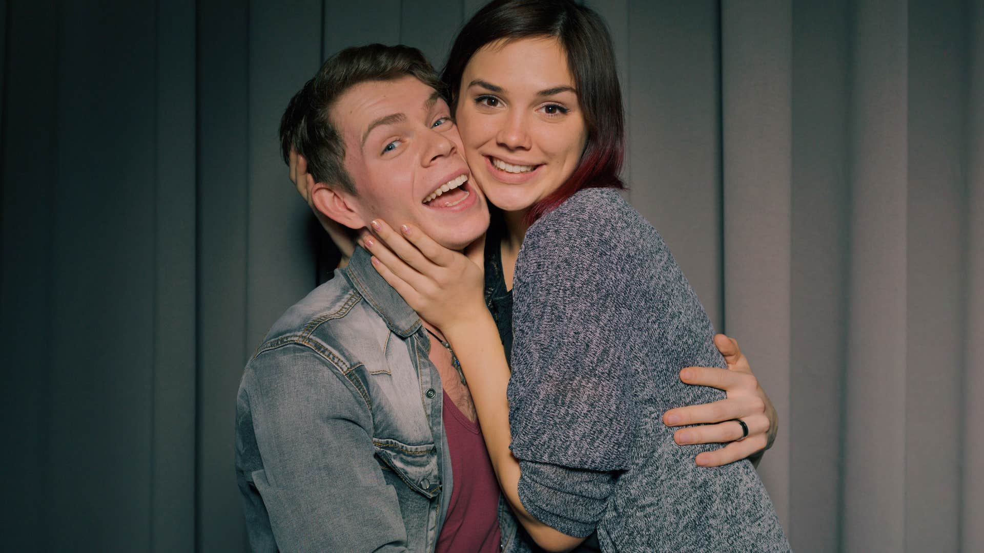 happy couple posing together saying lets go on a date