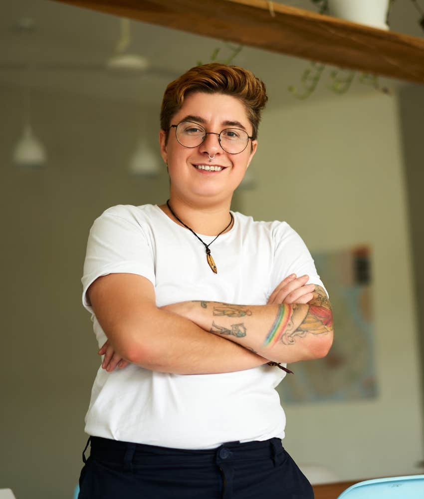 Confident person crosses arms showing empowerment is a step to take in life