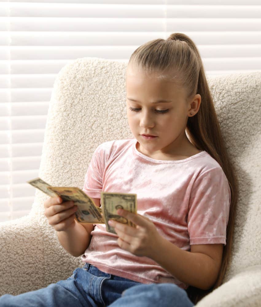 Stepdaughter learning how to manage money by paying for hobbies with allowance