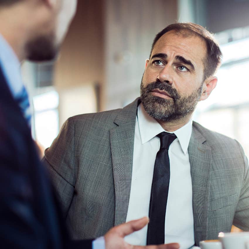 rude man saying don't you think you should do something about that to his co-worker