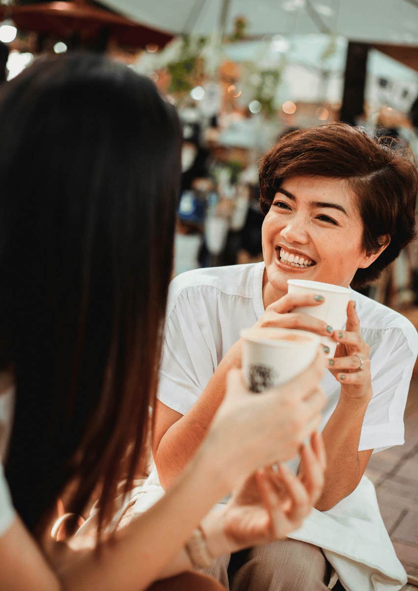 joyful friends hanging out pausing before speaking
